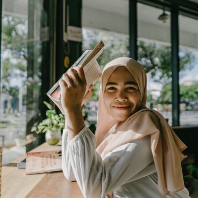 Girl studying with book - credits Umar Ben